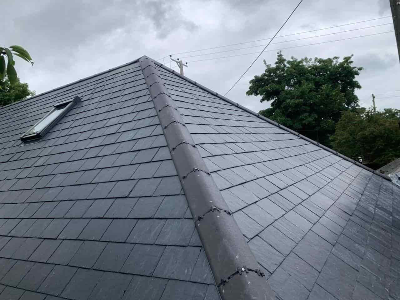 this is a photo of a new slate roof installed in Whitstable. All works carried out by Whitstable Roofers
